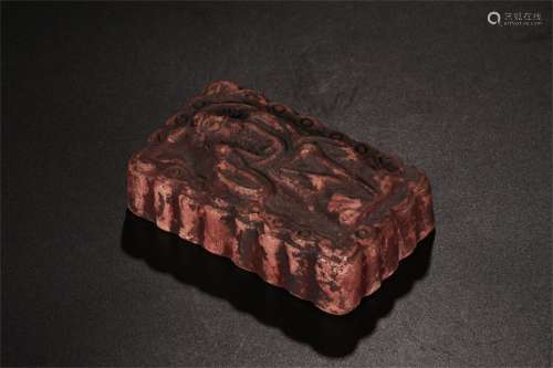 A Chinese Carved Ink Stone Paper Weight