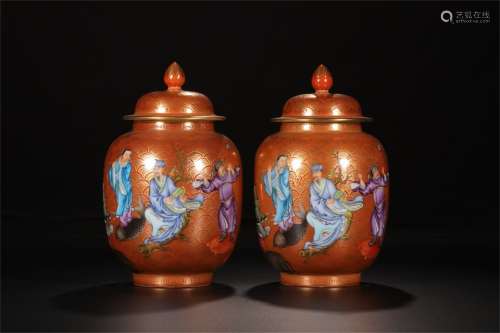 A Pair of Chinese Iron-Red Glazed Porcelain Jars with Covers