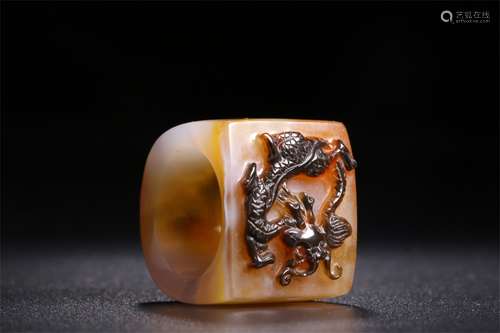 A Chinese Carved Agate Ring