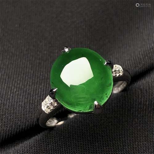 A Chinese Carved Jadeite Ring