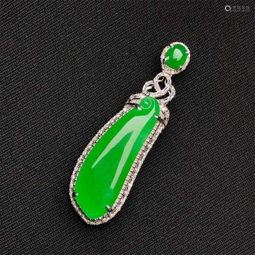 A Chinese Carved Jadeite Pendant