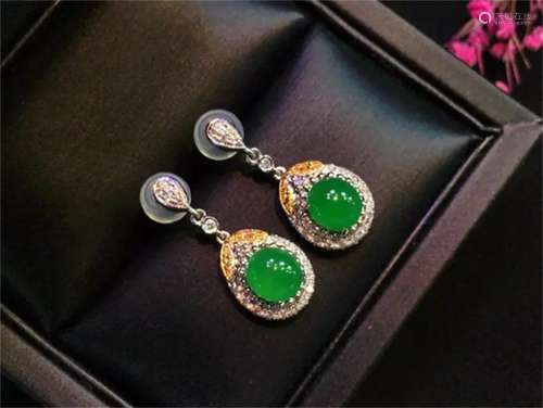 A Pair of Chinese Carved Jadeite Earrings