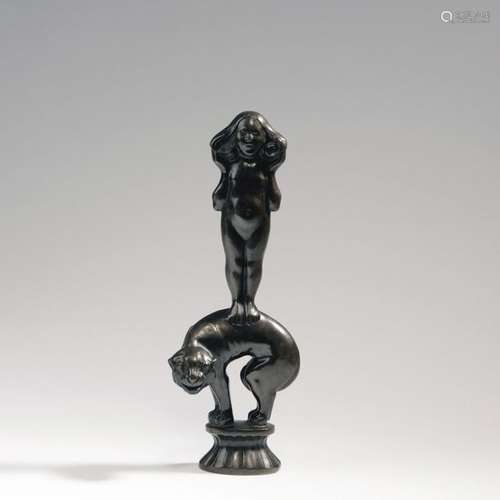 Vienna (presumably), Female figurine standing on a…