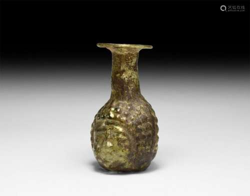 Roman Mould Blown Glass Vessel with Janiform Putto