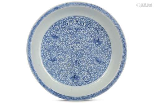 A CHINESE BLUE AND WHITE ‘BAT AND CHIME’ DISH.