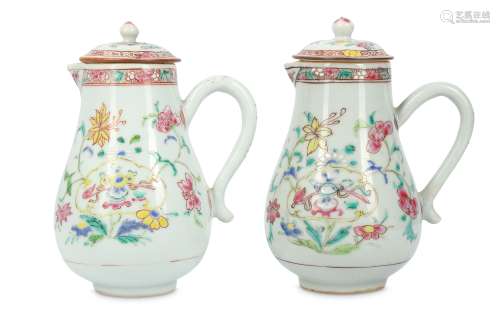 A PAIR OF CHINESE FAMILLE ROSE JUGS AND COVERS.