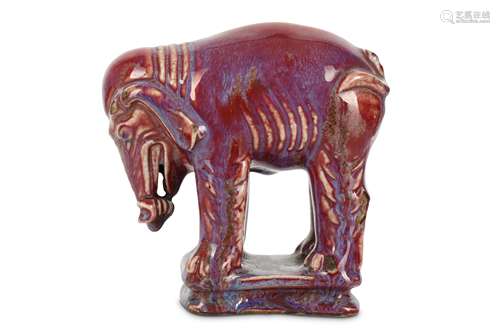 A CHINESE FLAMBÉ-GLAZED MODEL OF AN ELEPHANT.