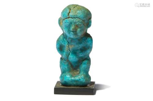 AN EGYPTIAN GLAZED COMPOSITION PATAIKOS AMULET