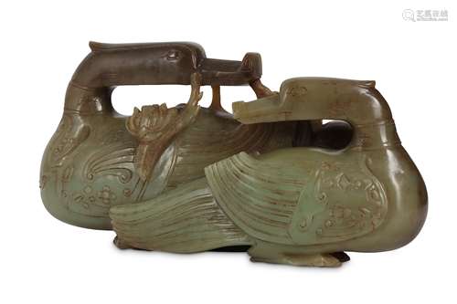 A CHINESE CELADON JADE ARCHAISTIC 'MANDARIN DUCKS' CARVING.