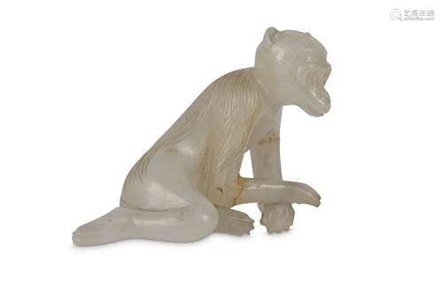 A CHINESE WHITE JADE MONKEY CARVING.