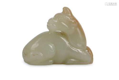 A CHINESE PALE CELADON JADE ‘UNICORN’ CARVING.