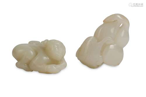 A CHINESE PALE CELADON JADE CARVING OF A BOY AND DOUBLE GOURD PENDANT.