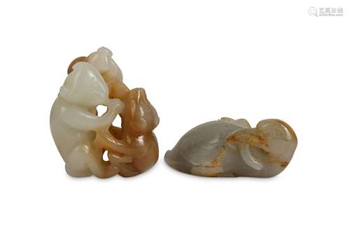 A CHINESE PALE CELADON JADE BIRD AND MONKEY GROUP.