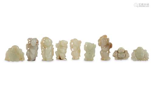 A COLLECTION OF CHINESE PALE CELADON JADE FIGURES.