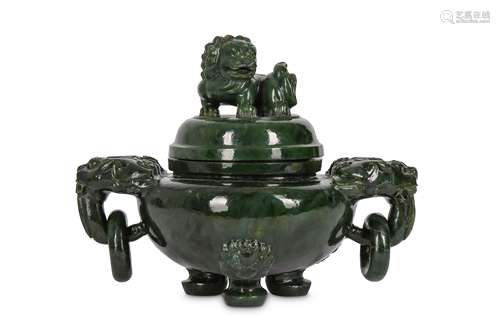 A LARGE CHINESE SPINACH JADE ‘LION DOG’ INCENSE BURNER AND COVER.