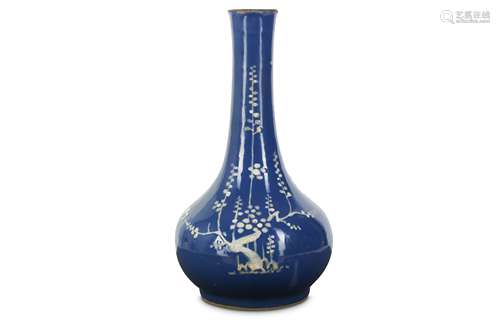 A CHINESE BLUE-GLAZED SLIP-DECORATED ‘PRUNUS’ BOTTLE VASE.