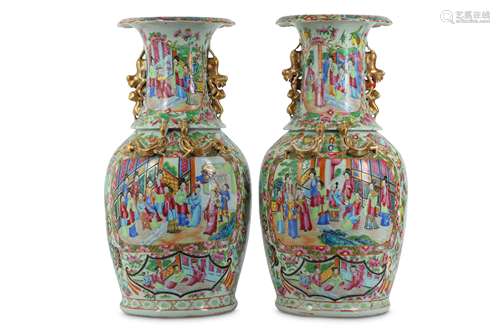 A PAIR OF FAMILLE ROSE CANTON VASES.