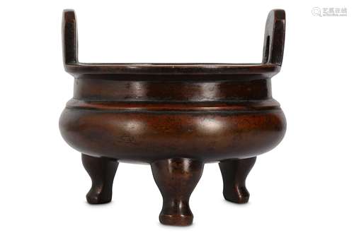 A CHINESE BRONZE TRIPOD INCENSE BURNER.