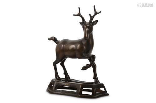 A CHINESE BRONZE MODEL OF A DEER.