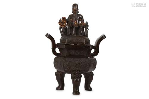 A CHINESE GILT-BRONZE INCENSE BURNER AND FIGURATIVE COVER.