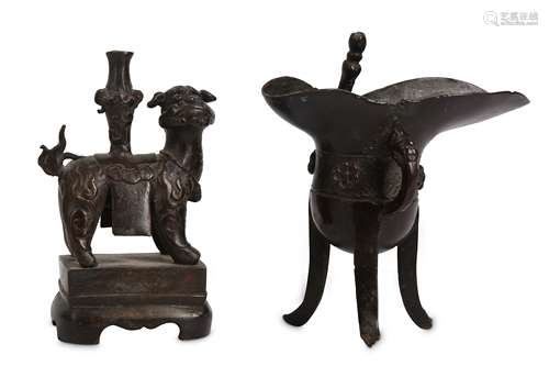 A CHINESE BRONZE ‘LION DOG’ JOSS STICK HOLDER AND A RITUAL VESSEL, JUE.