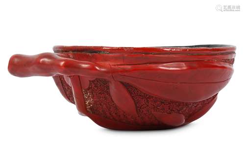 A CHINESE CINNABAR LACQUER 'PEACH' CUP.