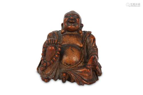 A SMALL CHINESE BAMBOO CARVING OF BUDAI HESHANG.