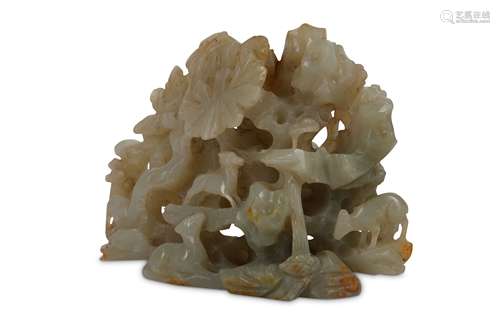 A CHINESE PALE CELADON JADE 'DEER' CARVING.