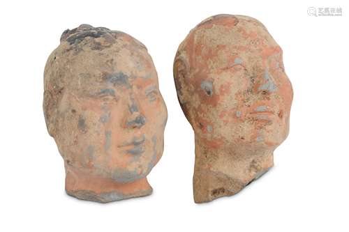 TWO CHINESE POTTERY HEADS.