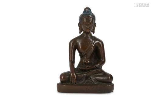 A NEPALESE BRONZE FIGURE OF SHAKYAMUNI BUDDHA.