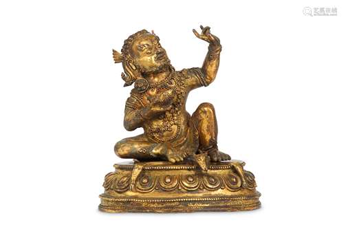 A TIBETAN GILT-BRONZE BUDDHIST FIGURE OF MILAREPA.