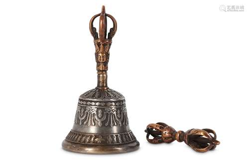 A TIBETAN GHANTA BELL AND A VAJRA.