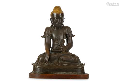 A BRONZE FIGURE OF A SAKYAMUNI BUDDHA.