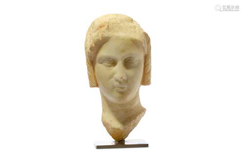 A PTOLEMAIC MARBLE HEAD OF A WOMAN