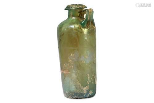 A ROMAN GREEN GLASS JUG