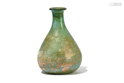 A ROMAN GREEN GLASS FLASK