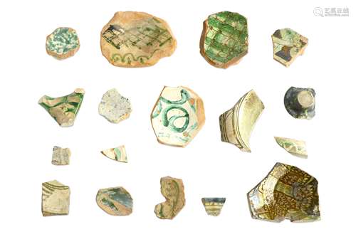 A GROUP OF BYZANTINE GLAZED POTTERY FRAGMENTS