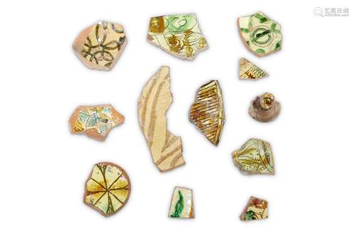 A GROUP OF BYZANTINE GLAZED POTTERY FRAGMENTS