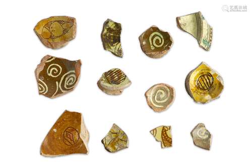 A GROUP OF BYZANTINE GLAZED POTTERY FRAGMENTS