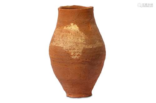 AN EGYPTIAN POTTERY JAR