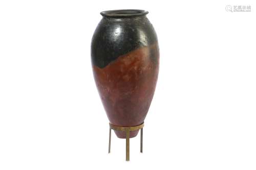 A LARGE EGYPTIAN BLACK-TOPPED POTTERY JAR