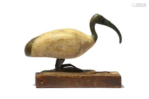 AN EGYPTIAN WOOD AND BRONZE AFTER THE ANTIQUE IBIS