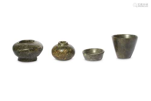 FOUR BLACK STONE VESSELS