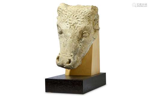 A ROMAN LIMESTONE BULL'S HEAD