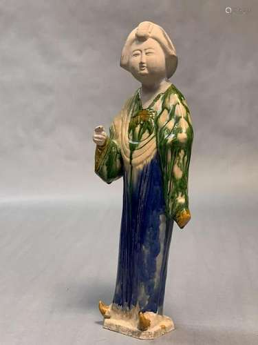 A  Tang Dynasty Sancai glazed Standing Lady