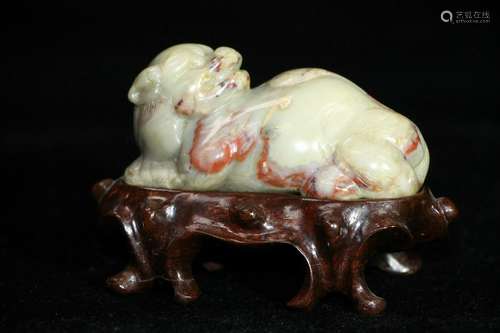 A Yellow-Green Jade Carved Crouching Dog