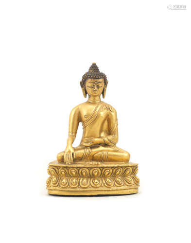 Tibet,16th/17th century A gilt-bronze figure of Buddha Akshobhya