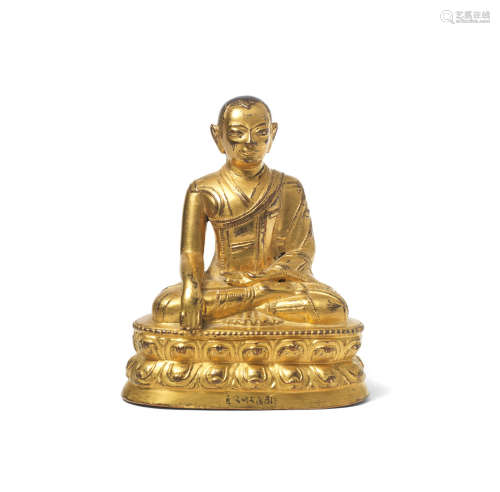 Tibet, 17th century A rare gilt-bronze inscribed figure of Lha Jegar Tönpa