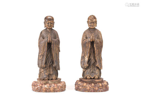 Ming Dynasty or earlier Two wood figures of Ananda and Kasyapa