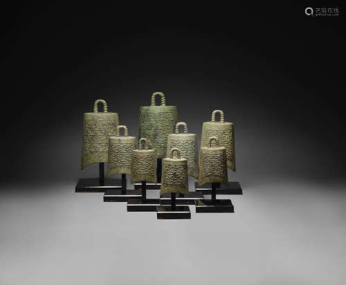 Eastern Zhou Dynasty A rare set of eight archaic graduated ritual bronze bells, bianzhong